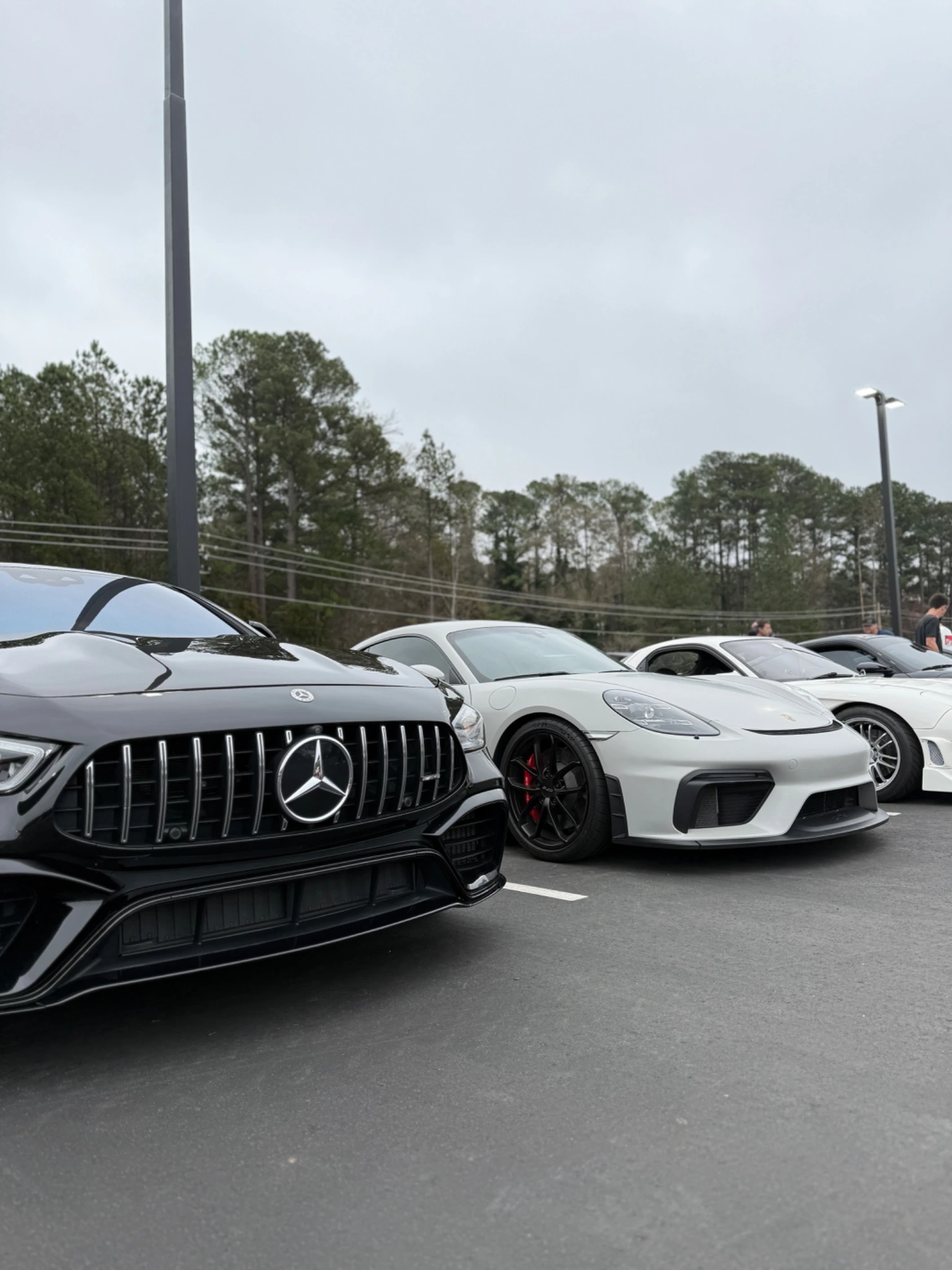 Several performance vehicles lined up for side-by-side comparison