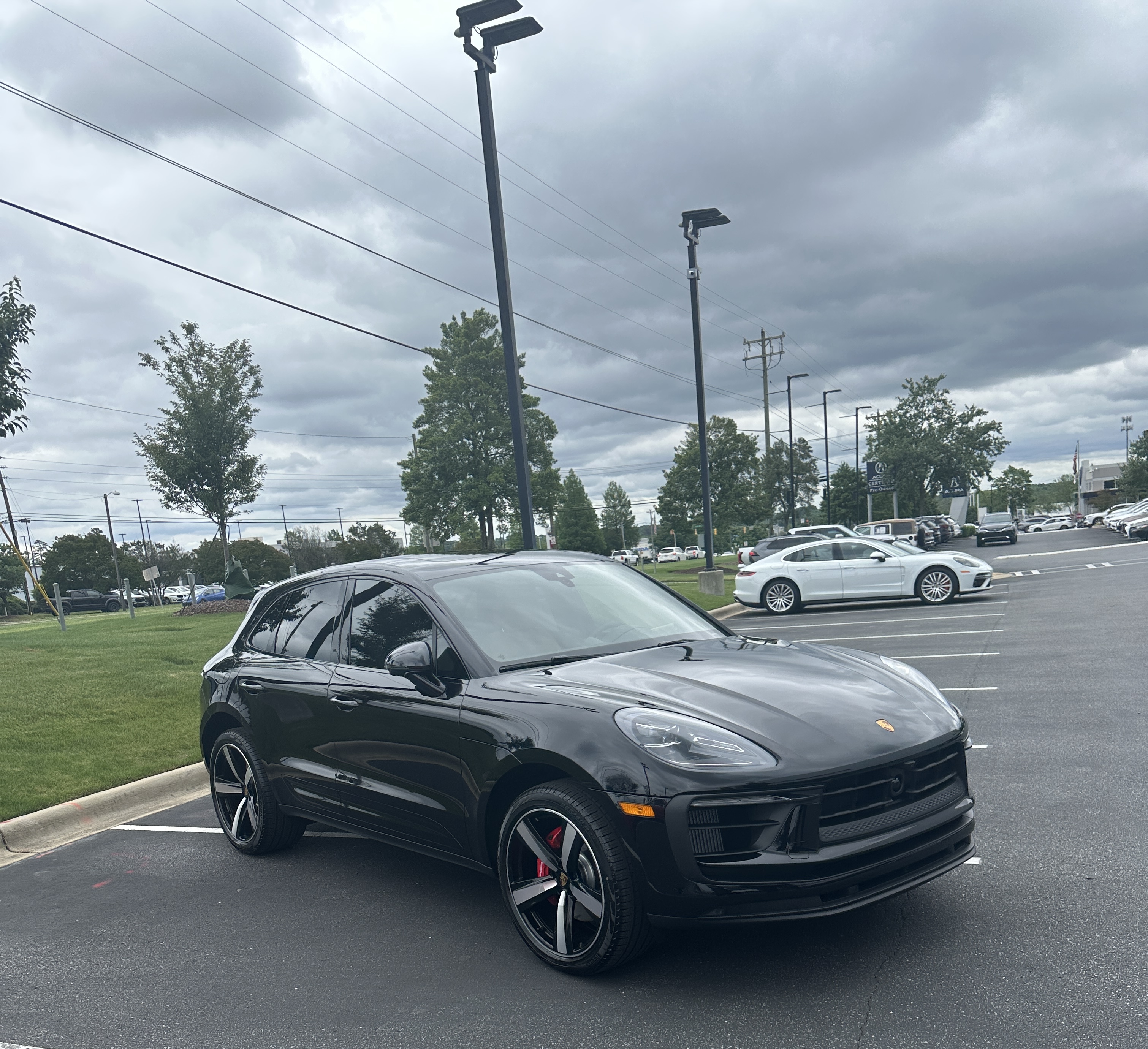 Black Porsche Macan selected after the client’s guided comparison